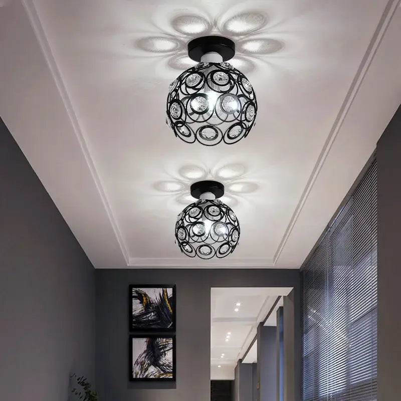 Modern black crystal flush mount ceiling light with intricate circular metalwork and embedded clear crystals for hallway decorbites crystal flush