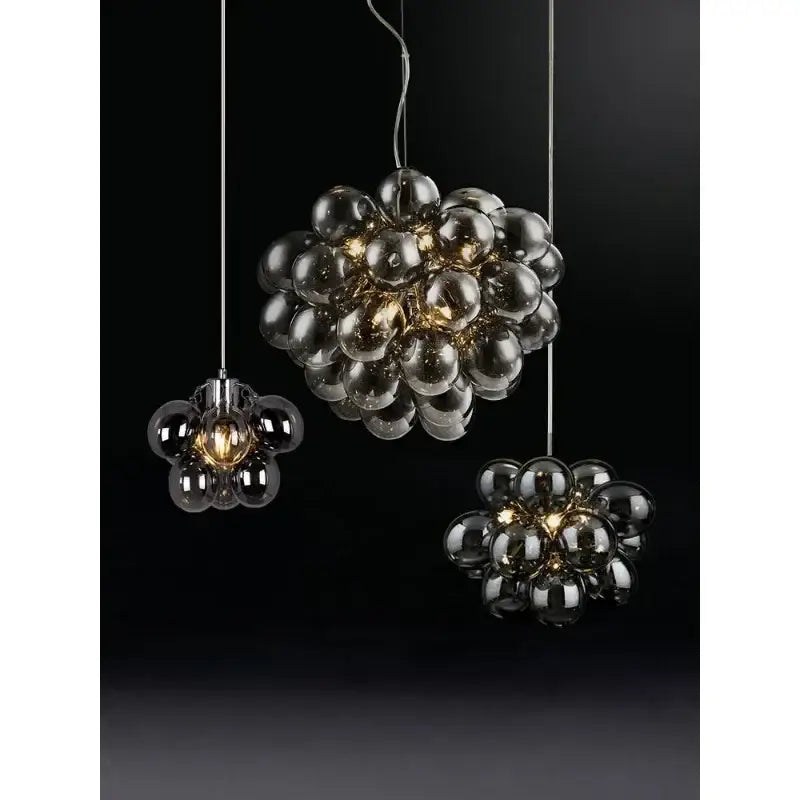 Modern black crystal grape chandelier with sleek glass bubble pendant lights in dark smoked finish for dining room decorbites crystal