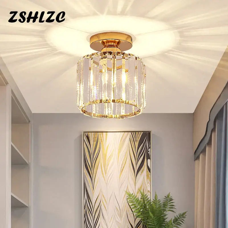 Modern black crystal led ceiling light with gold-toned crystal chandelier and clear faceted glass elements by decorbites