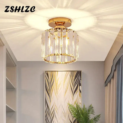 Modern black crystal led ceiling light with gold-toned crystal chandelier and clear faceted glass elements by decorbites
