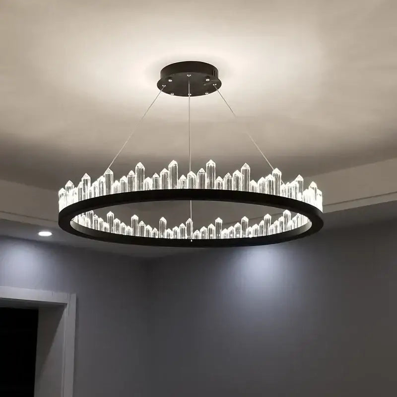 Modern black crystal led pendant light with illuminated crystal led rods in a circular design for pendant lights decorbites