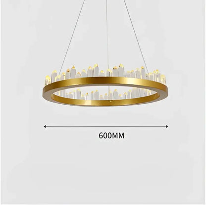 Modern black crystal led pendant light with gold-toned circular chandelier featuring illuminated cityscape decorbites crystal led design