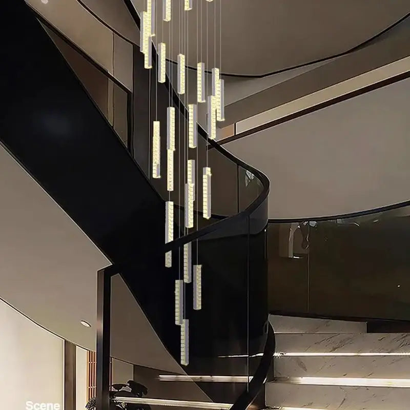 Modern black crystal pendant light with cascading rectangular led modules suspended from a sleek staircase chandelier