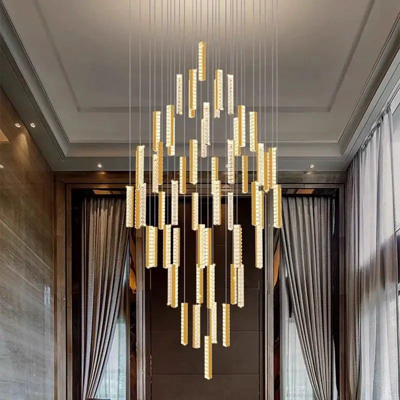Modern black crystal pendant light with golden vertical rectangular light bars ideal for stairwell illumination
