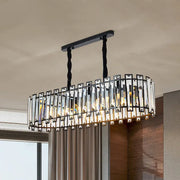 Elegant modern black crystal prism island pendant with oval black metal frame and clear crystal bars for dining room use