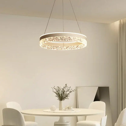 Modern black crystal ring led pendant light with sleek metallic frame and decorbites crystal ring for bedroom lighting