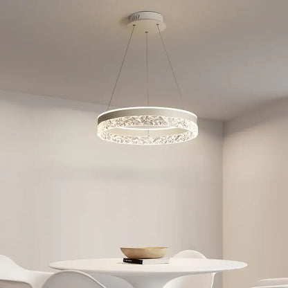 Modern white pendant light with decorbites crystal ring led and sleek metallic suspension for bedroom lighting