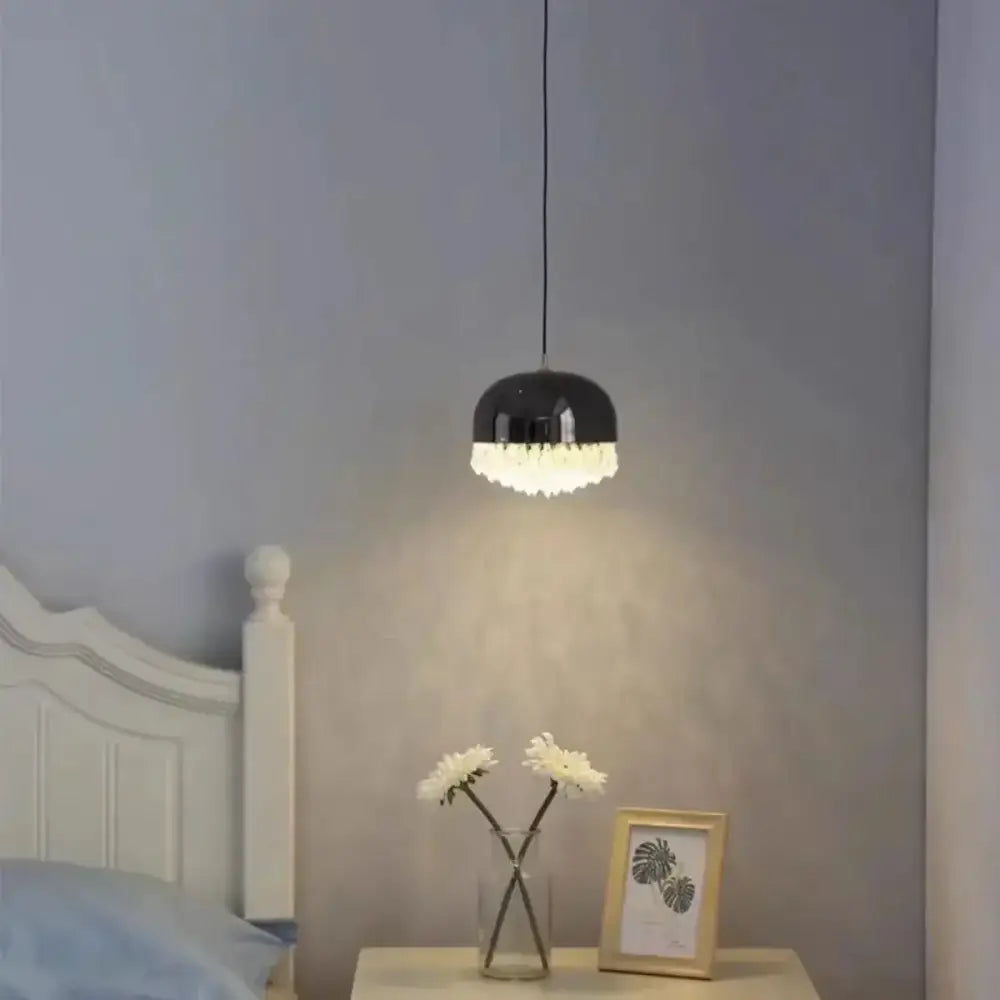 Modern black dome pendant light with cascading crystal tassel chandelier perfect for bedroom lighting