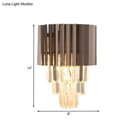 Modern black crystal wall light featuring a dark bronze metallic frame with cascading faceted crystal prisms for bedroom use