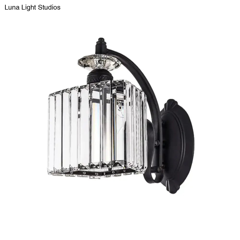 Modern black wrought iron wall light with clear faceted crystal cage and curved arm for living room decor