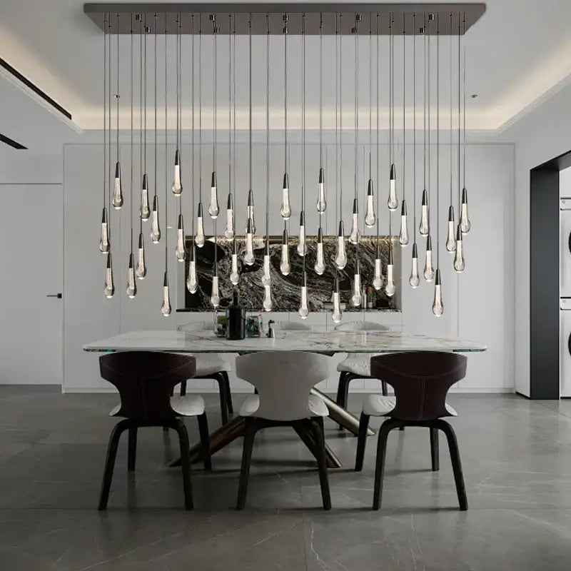 Modern black chandelier light fixture with teardrop crystal pendants by decorbites for stairwell decor