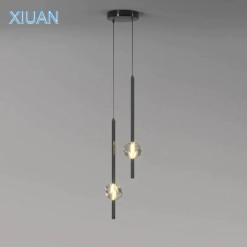 Modern black cube crystal pendant lamps feature crystal-like glass shades with sleek cylindrical metal rods for living room decorbites cube crystal lighting