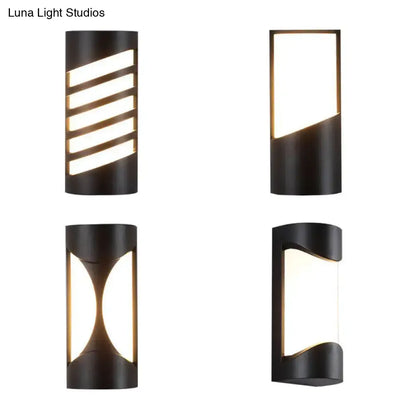 Modern black curved outdoor wall sconce with sleek geometric led light patterns for patio illumination
