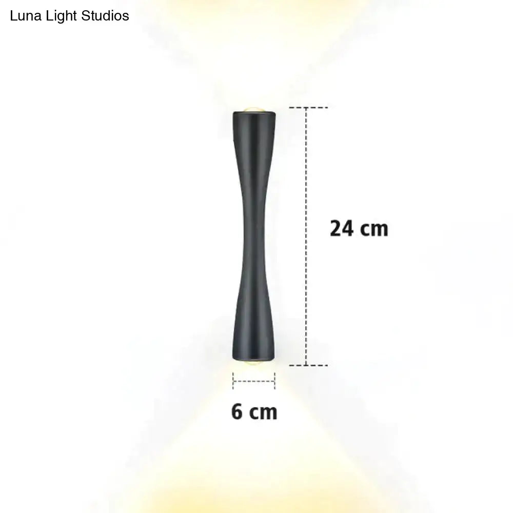 Modern black curved wall sconce with black matte finish and sleek elongated design for outdoor waterproof porch lighting