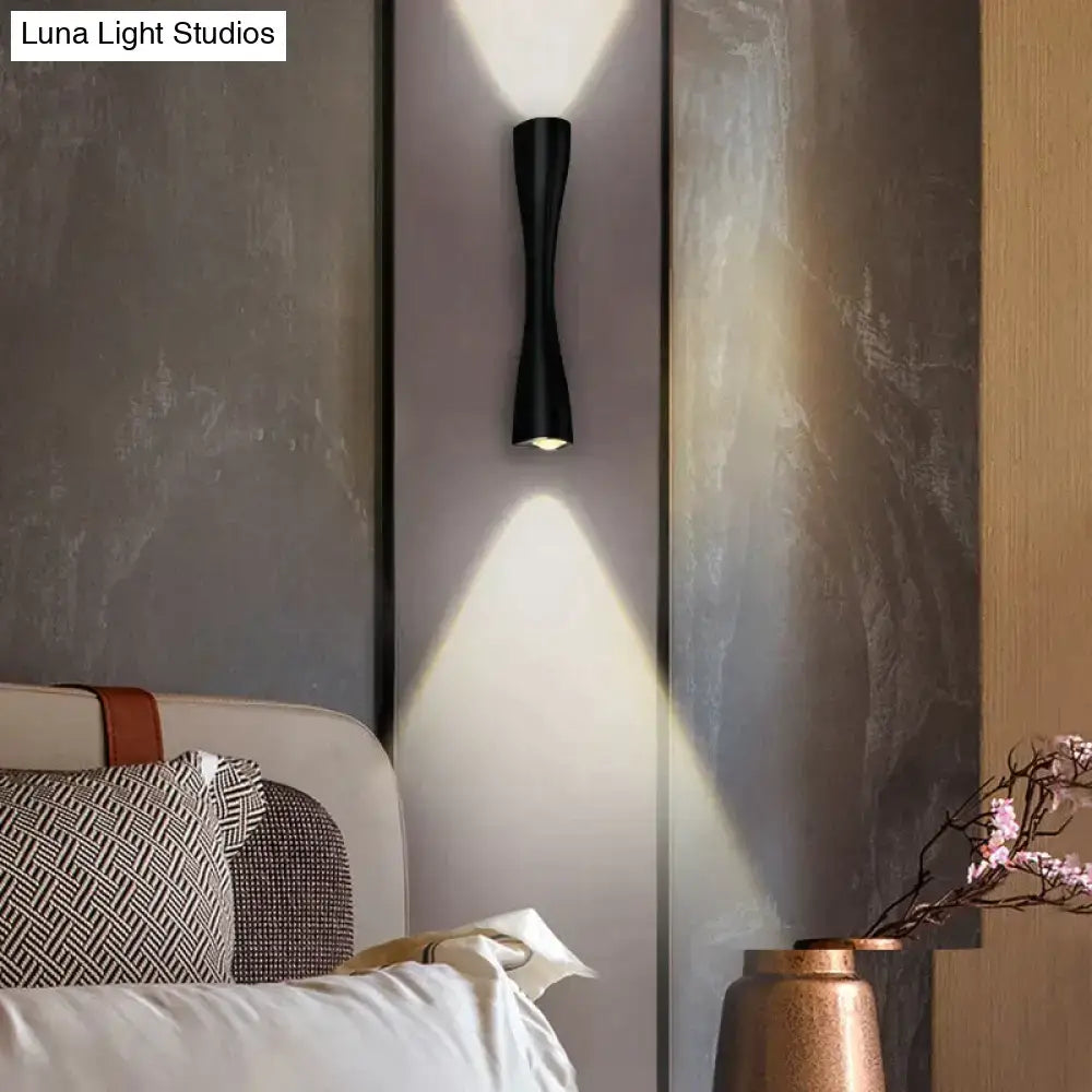 Modern black curved wall sconce featuring a sleek design for outdoor waterproof porch lighting