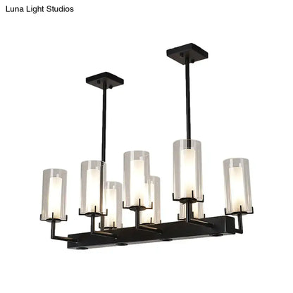Black metal chandelier with cylinder clear glass shades designed as clear glass island light for traditional pendant lighting