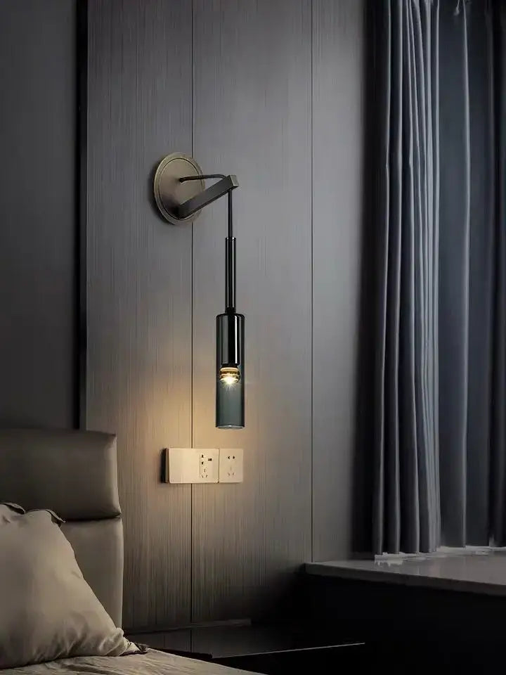Modern black cylindrical crystal wall light with brushed metal base ideal for living room decorbites wall light