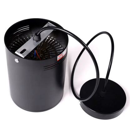 Modern black cylindrical pendant ceiling spot light with sleek design and circular base for kitchen lighting