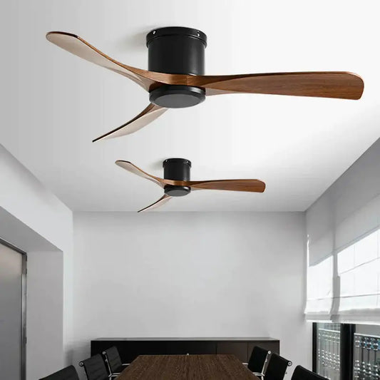 Modern ceiling fan with sleek black dc motor and dark wood blades featuring remote control for dining room use