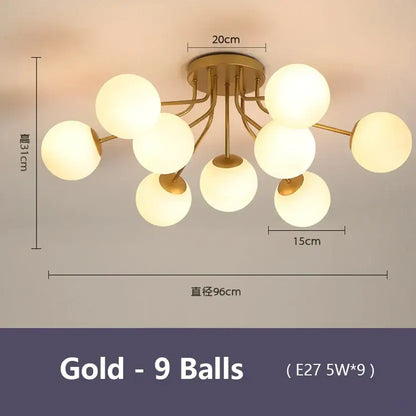 Modern black decorbites bubble glass led ceiling light with nine frosted glass spheres in a gold-toned branching design