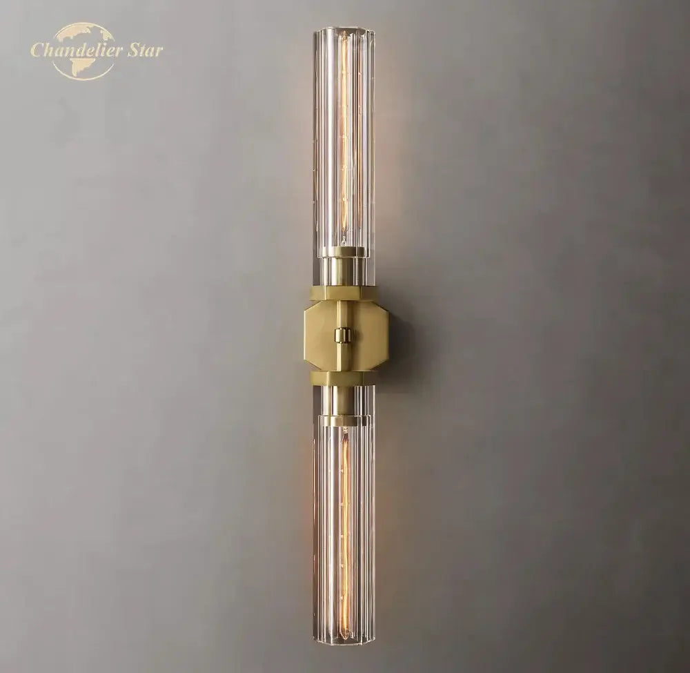 Gold-toned decorbites crystal hexagonal wall sconce with clear glass tubes and brass accent for modern living room decor