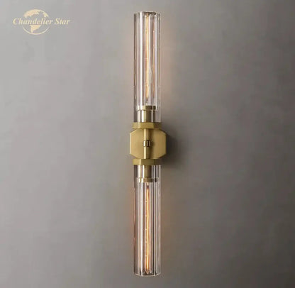 Gold-toned decorbites crystal hexagonal wall sconce with clear glass tubes and brass accent for modern living room decor
