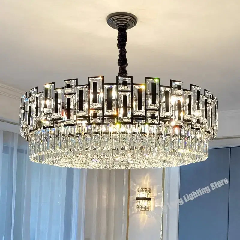 A modern black decorbites crystal led chandelier with clear glass prisms and metal frame for dining room lighting