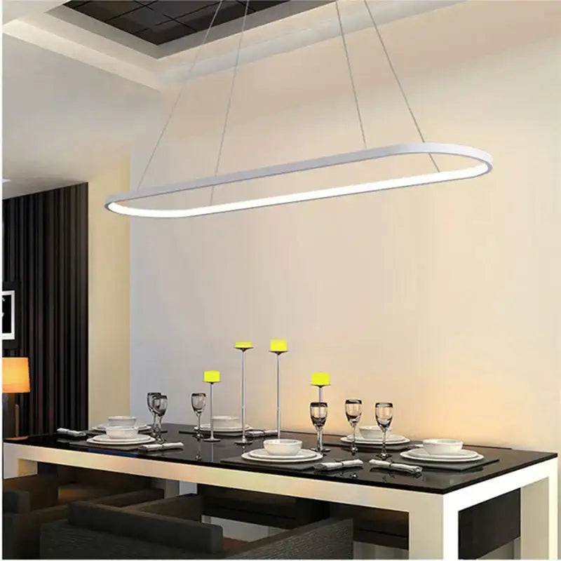Modern black decorbites designer oval pendant lamp with sleek white LED frame and bright illumination for dining room