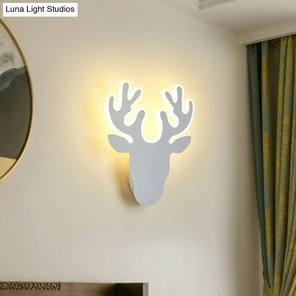 Modern white deer-shaped wall sconce light with glowing yellow illumination for living room sconce light decor