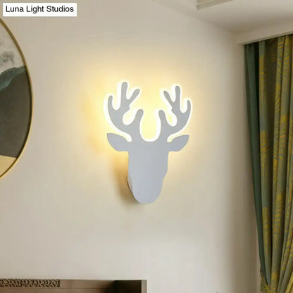 Modern white deer-shaped wall sconce light with glowing yellow illumination for living room sconce light decor