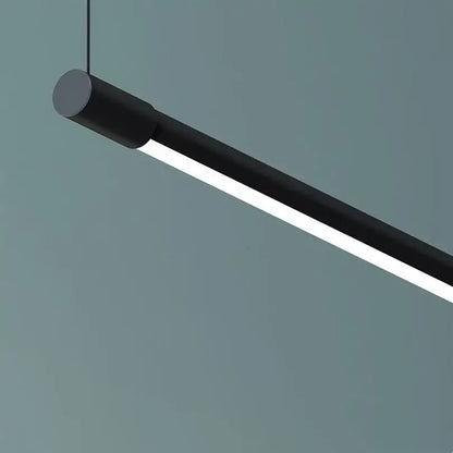 Modern black dimmable pendant light with sleek cylindrical design and illuminated led strip for dining room decorbites