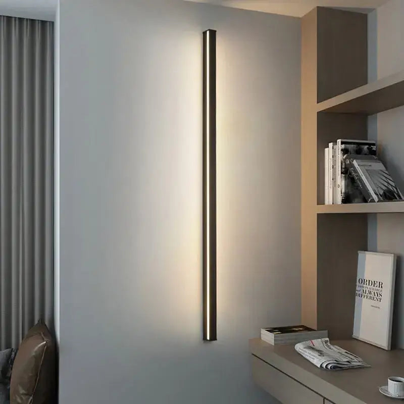 Modern black decorbites dimmable long wall lamp with slim metallic cylindrical design for bedroom ambient lighting