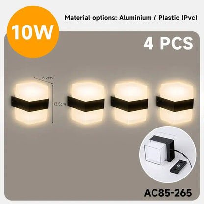 Set of four modern black and white hexagonal led wall lights with aluminum or pvc construction for outdoor use