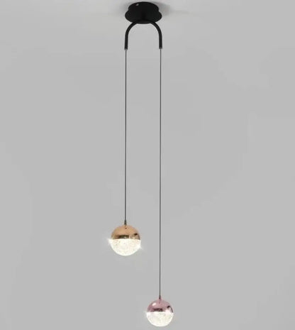 Modern black double glass ball pendant light with rose gold and copper finishes for bedroom ceiling lighting