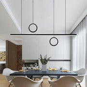 Modern black minimalist DecorBites™ Nordic dual ring LED acrylic island pendant light hanging in a dining room
