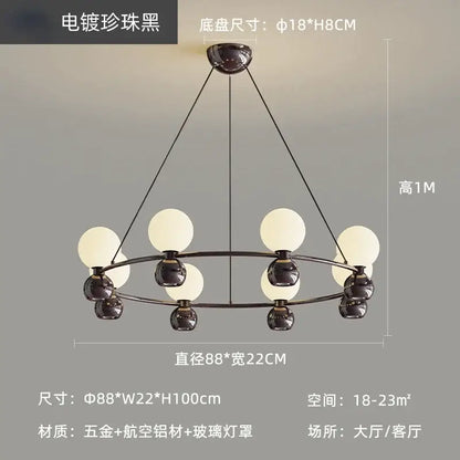 Modern black nordic pendant chandelier with eight frosted glass globe shades and sleek electroplated metal frame for living room
