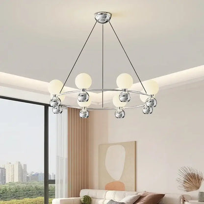 Modern black nordic pendant chandelier with eight spherical frosted glass shades and chrome details for living room use