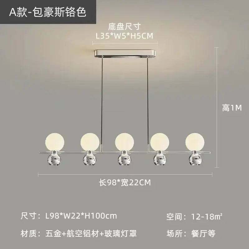 A modern black nordic pendant chandelier with five frosted glass globe shades and polished chrome rods for living room