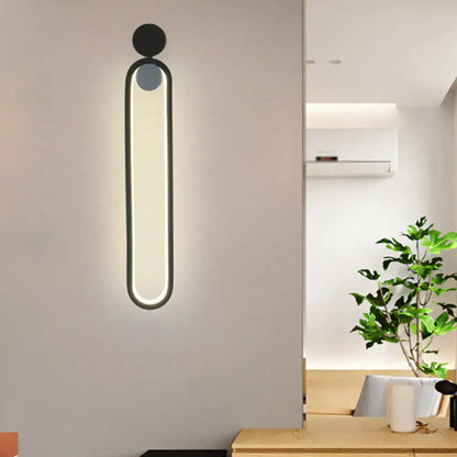 Modern black elliptical wall lamp with sleek oval design and circular accents for study room led sconce 220v-240v maximum bulb wattage