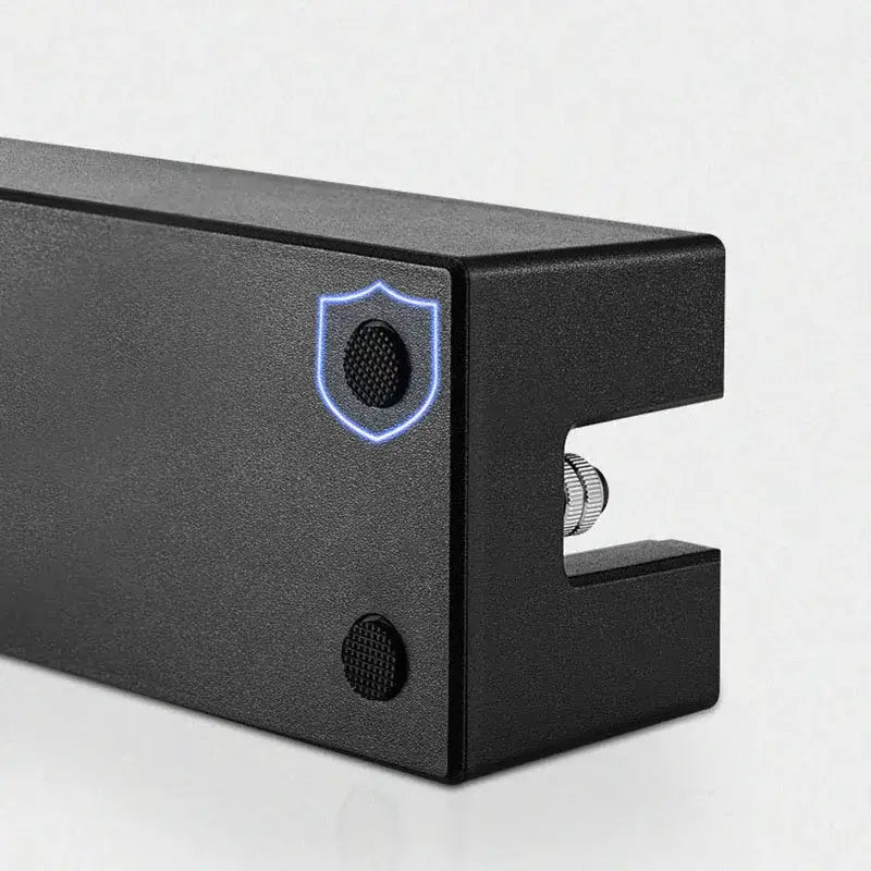 Modern black espresso tamper station with a glowing blue shield emblem and textured circular buttons by decorbites espresso tamper