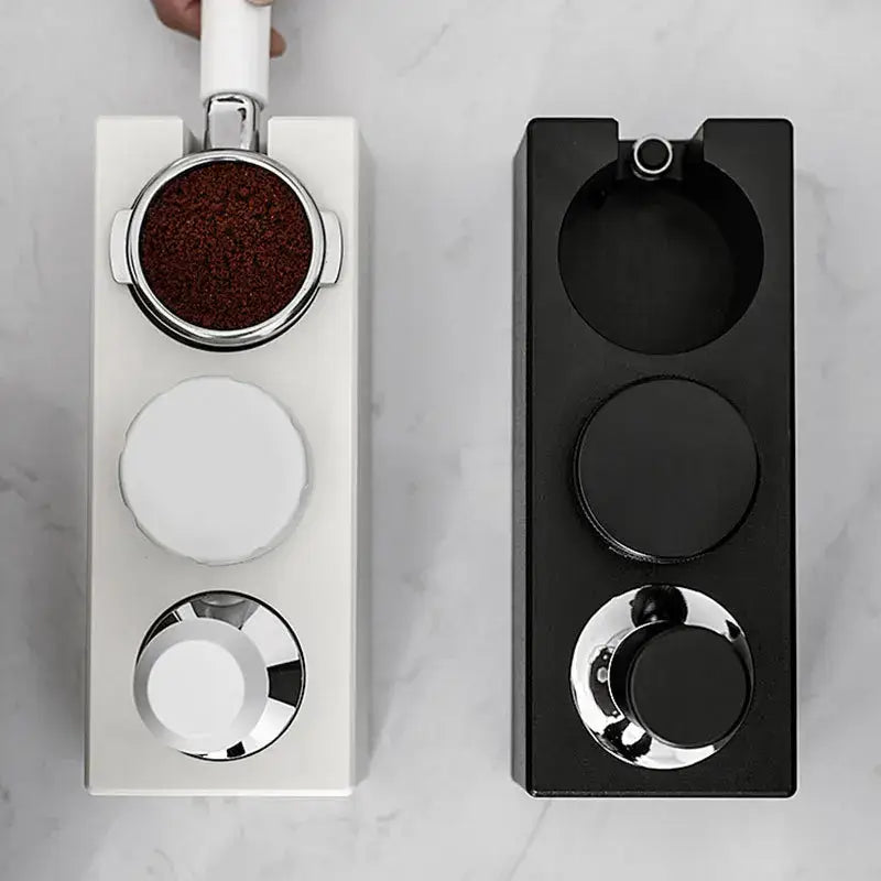 Modern black espresso tamper station with white and black chrome portafilter holders for decorbites espresso tamper use