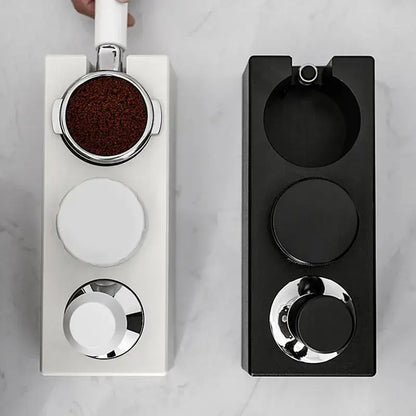 Modern black espresso tamper station with white and black chrome portafilter holders for decorbites espresso tamper use
