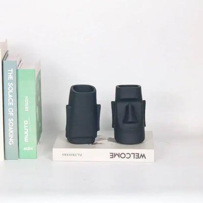Modern black face desktop organizer set of two matte black ceramic moai statues by decorbites for desktop decor