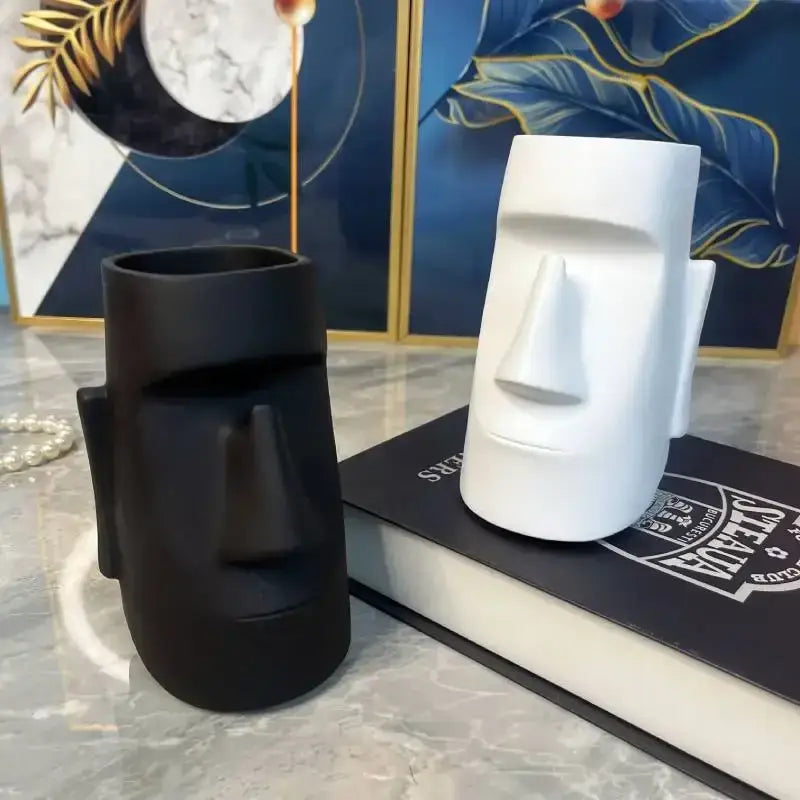 Modern black face desktop organizer resin statue holder with black and white ceramic moai head vases by decorbites desktop organizer