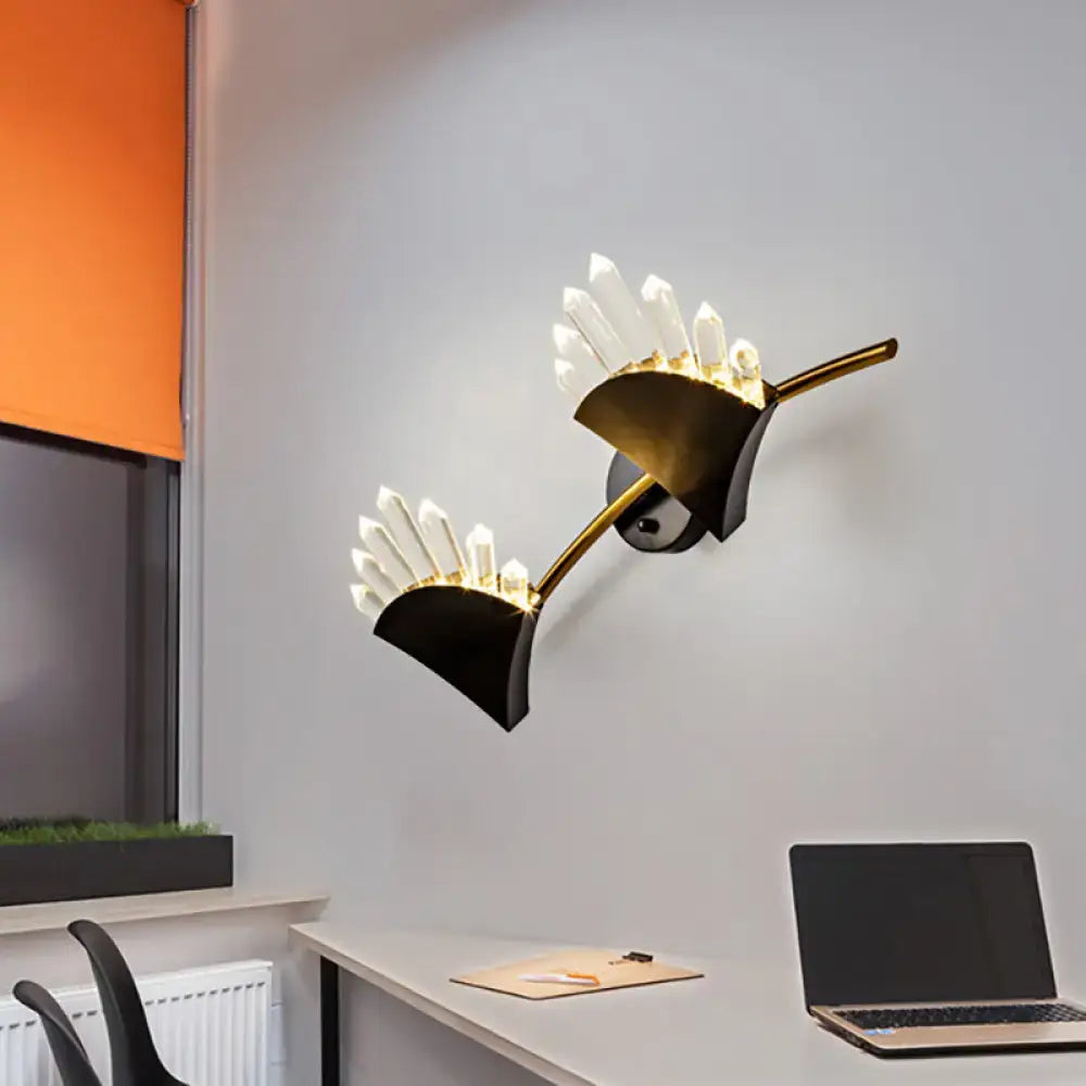 Modern black fan wall light fixture with gold-toned sconce, black accents, clear crystal prisms, and smd bulb base