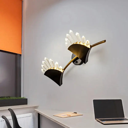 Modern black fan wall light fixture with gold-toned sconce, black accents, clear crystal prisms, and smd bulb base