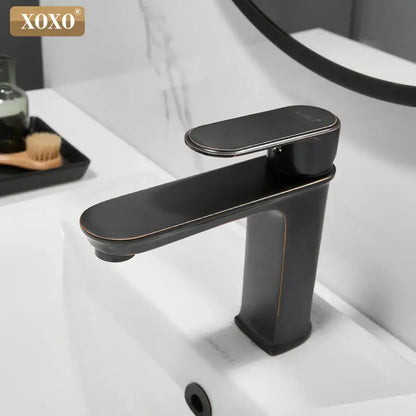 Xoxo modern basin faucet in black finish brass with matte black and subtle gold trim for bathroom hot cold water mixer
