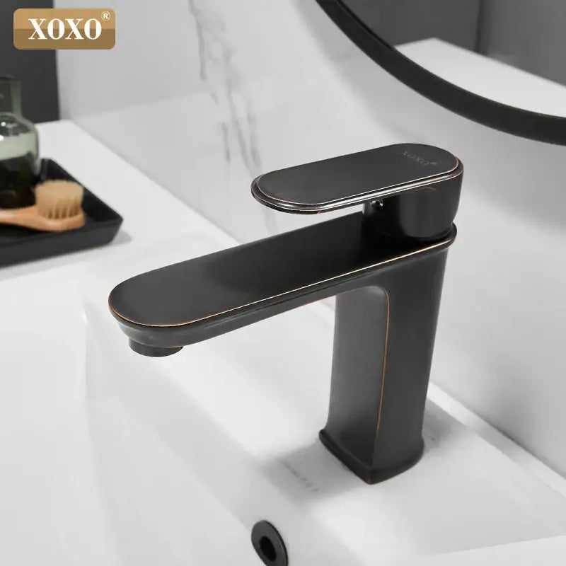 Xoxo modern basin faucet in black finish brass with matte black and subtle gold trim for bathroom hot cold water mixer