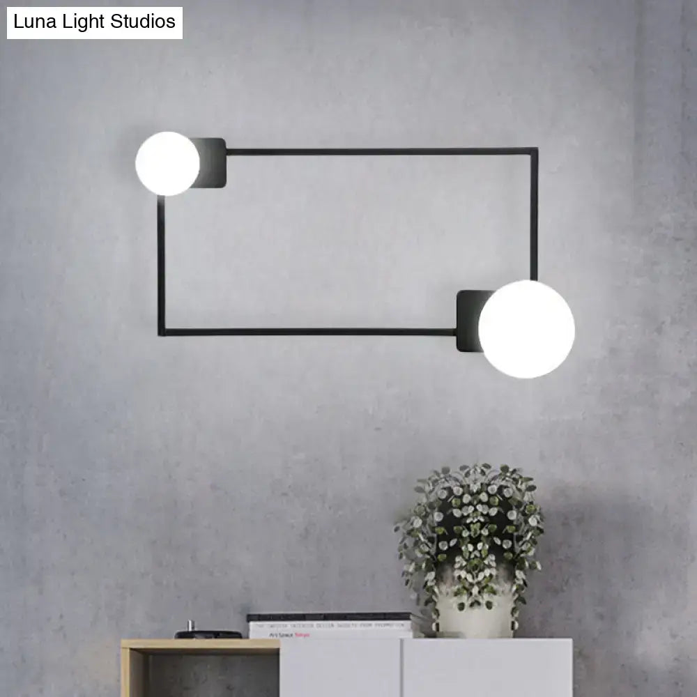 Modern black finish rectangle wall sconce with two white glass globe bulbs for bedroom lighting