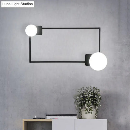 Modern black finish rectangle wall sconce with two white glass globe bulbs for bedroom lighting